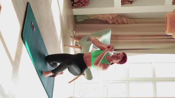 Woman Exercising at Home