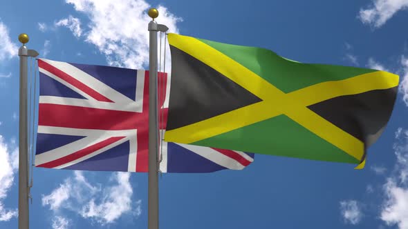 United Kingdom Flag Vs Jamaica Flag On Flagpole