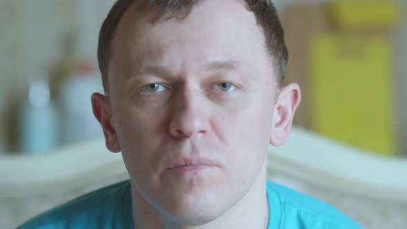 Portrait of a Man with Gray Eyes Looking at the Camera Selective Focus