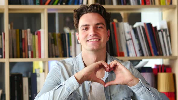 Heart Sign by Hands, Young Man