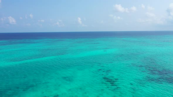 Aerial drone view nature of paradise island beach trip by aqua blue ocean with white sand background