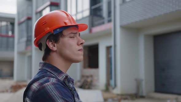 Close Up View of a Young Worker on His Work