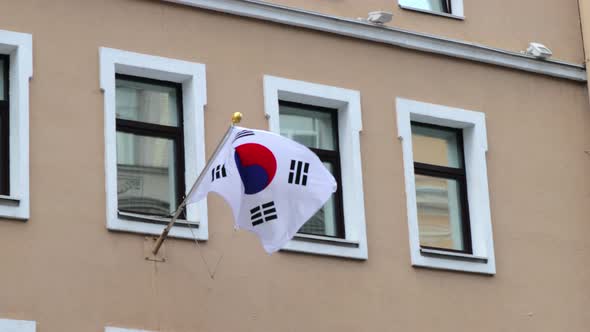 The Flag of South Korea on the Flagpole is Installed on the Building