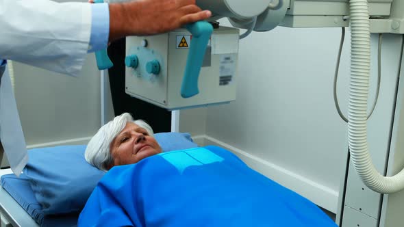 Senior woman undergoing an x-ray test