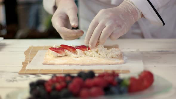 Chef's Hands Making Dessert.