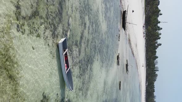 Vertical Video of Low Tide in the Ocean Near the Coast of Zanzibar Tanzania Aerial View