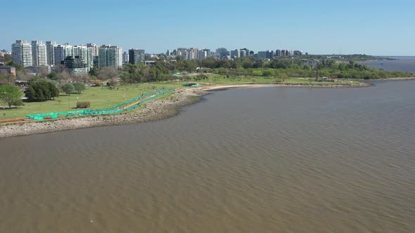 Aerial forward modern City warterfront. North of buenos aires capital city from the river. Skyline,