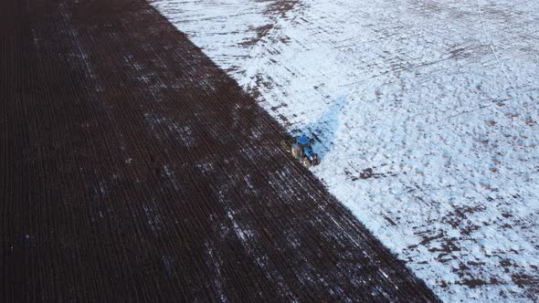 Aerial view of the Tractor Cultivated Snowy Land