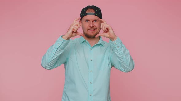 Photographer Man Gesturing Picture Frame with Hands Imitating Zoom and Cropping Nice Image Photo