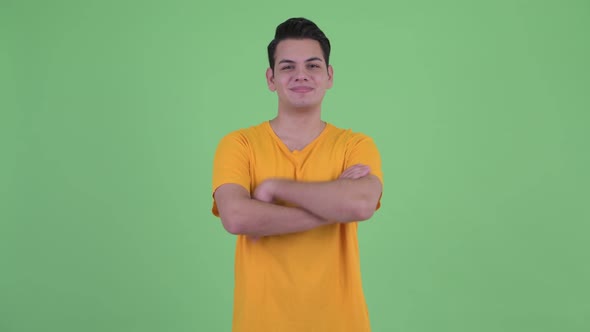 Happy Young Multi Ethnic Man Smiling with Arms Crossed