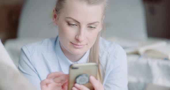 Beutiful Woman Using Smartphone and Smile