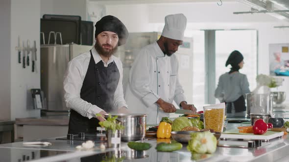 POV of Male Cook Recording Cooking Show Video on Camera