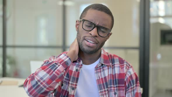 Portrait of African Man Having Neck Pain