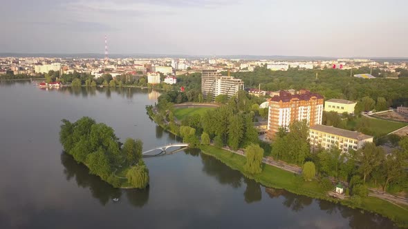 Aerial view of big lake and an island in the center of Ivano-Frankivsk city, Ukraine.