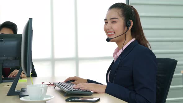 Business People Wearing Headset Working in Office