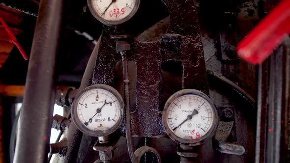  Dolly Video of Lots of Pipes, Valves and Gauges in Old Steam Locomotive Train Cabin.