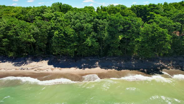 Spectacular Aerial drone video footage of beautiful Lake Erie during summer on a sunny day