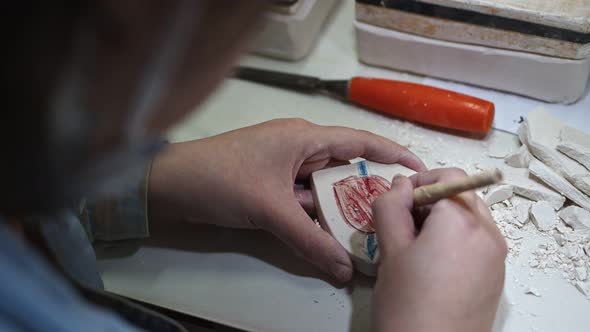 Working In A Ceramic Art Workshop 14