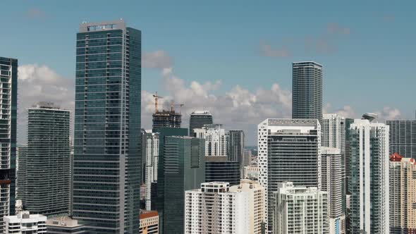 Aerial shot through buildings in Brickell downtown Miami 4K