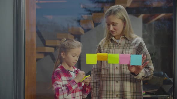 Cute Daughter Surprising Mother with Household Task