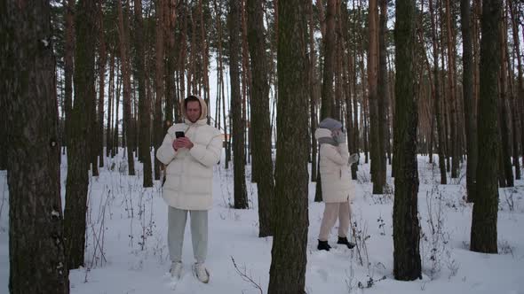 The Guy and the Girl Have No Phone Signal in the Forest