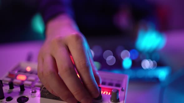 Close Up Shot of Hand's Man DJ Playing Music at Home Recording Studio Workshop. Student Learns To