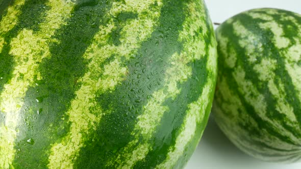 Two Watermelons  Covered In Drops Of Water