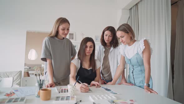 Front View of Four Beautiful Caucasian Female at Art Workshop