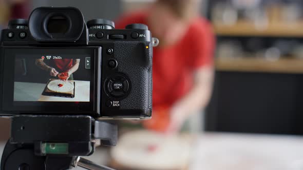 Camera Filming Food Blogger Preparing Pizza