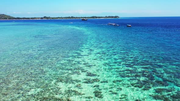 Aerial top down nature of beautiful coast beach trip by blue lagoon and white sandy background of a 