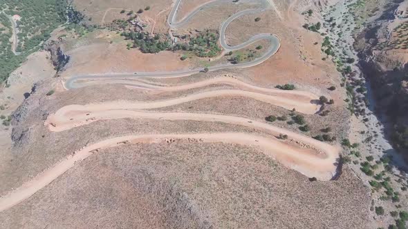 Curvy road near Hora Sfakion town on Southwest Crete island. A view from above. Greece.