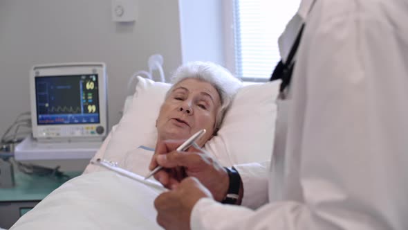 Senior Patient Speaking with Doctor