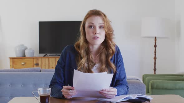 Portrait of woman working at home