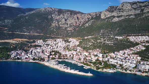 The top view from the drone of Kas resorts, bay, yahts, city in Mugla in Turkey