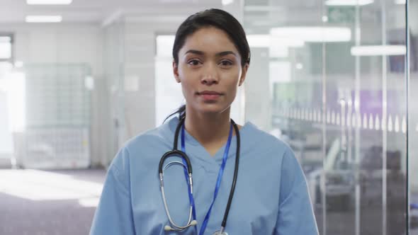 Portrait of female doctor smiling in hospital