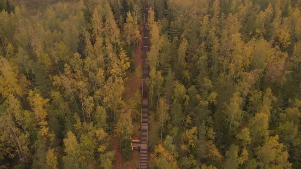 Aerial footage of drone flying away from hill.