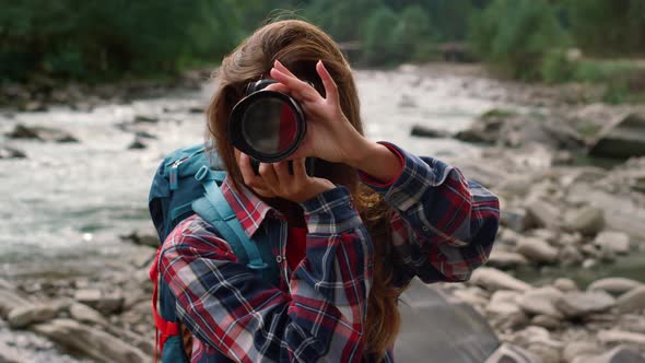 Girl Photographing in Mountains