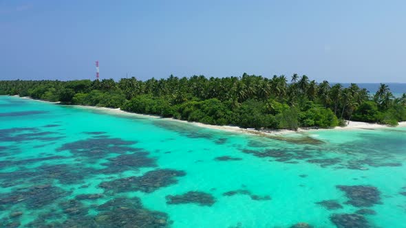 Wide angle flying island view of a sandy white paradise beach and aqua blue water background in best