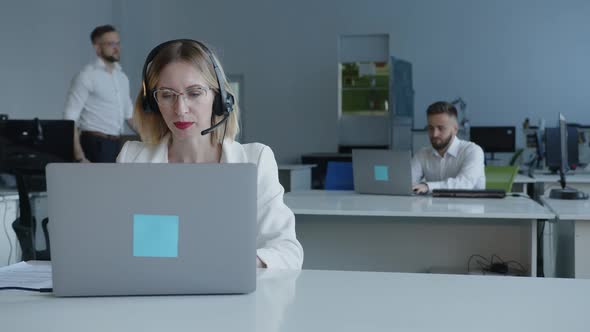 Close Up View of Concentrated Woman on the Laptop Work