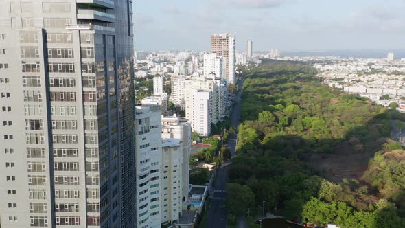 Empty, desolate and deserted Avenida Anacaona shiny glass skyscraper and downtown Santo Domingo city