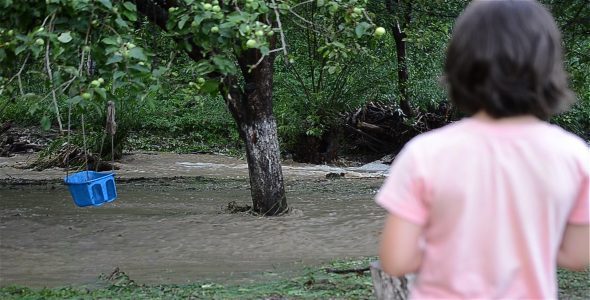 Girl Watching The Flood