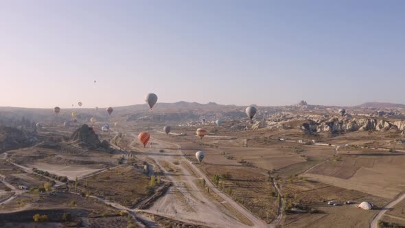 Hot Air Balloons Flying Over Goreme Village.