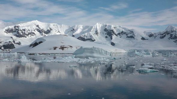 Global warming and climate change. Melting glaciers in the Arctica and Antarctica.