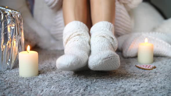 Cozy Winter Fall Season, Knitted Socks. Woman Relaxing At Home. Comfy Lifestyle