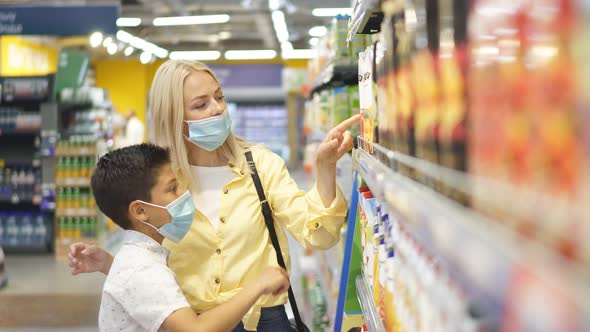 Happy Family in Medical Masks Shopping Together, Collect Groceries Home