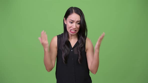 Young Beautiful Asian Businesswoman Looking Angry