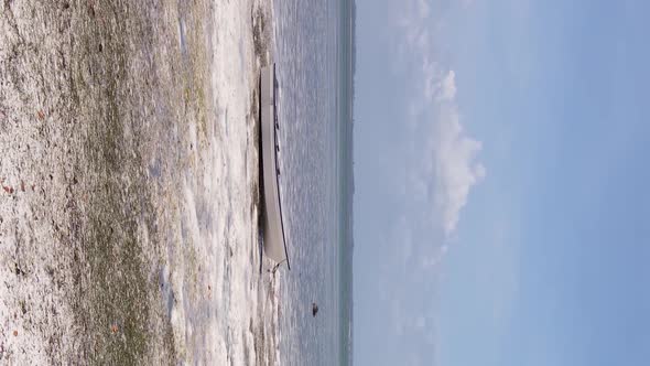 Vertical Video of Low Tide in the Ocean Near the Coast of Zanzibar Tanzania Aerial View