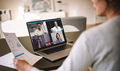 Woman discussing business with team over a video conference - PhotoDune Item for Sale