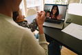 Women with their kids having a video call on laptop - PhotoDune Item for Sale