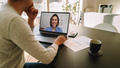 Woman teleconferencing with female colleague on laptop - PhotoDune Item for Sale